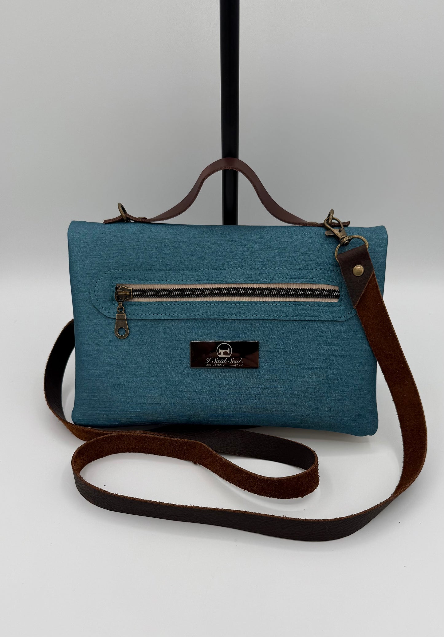 Bend and Snap Clutch Bag